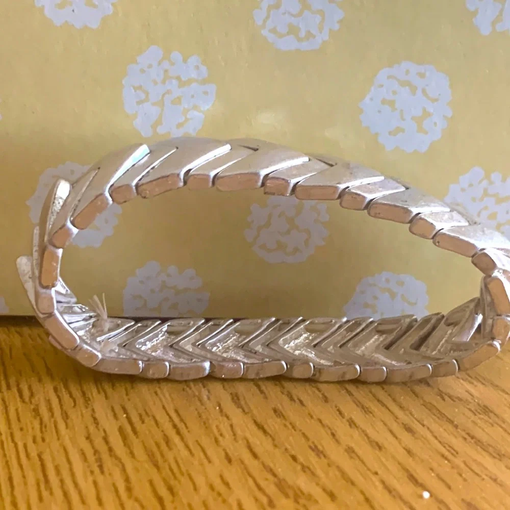 Silver, one size, gently used bracelet. Stretchy and will fit most wrists. - Picture 1 of 3